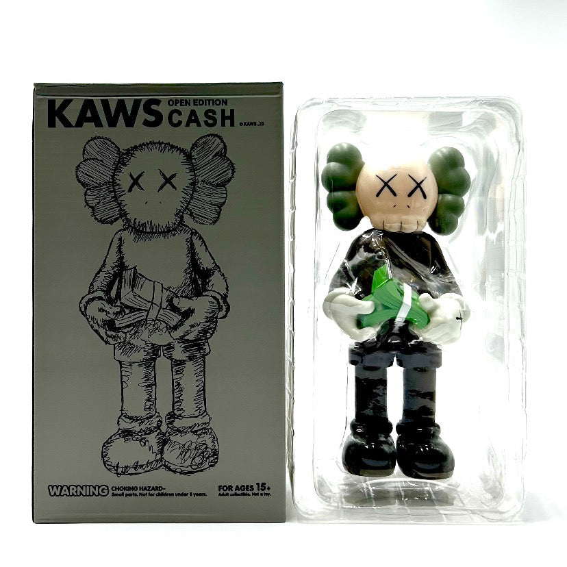 KAWS CASH Brown (KAWS cash companion). New & unopened in its