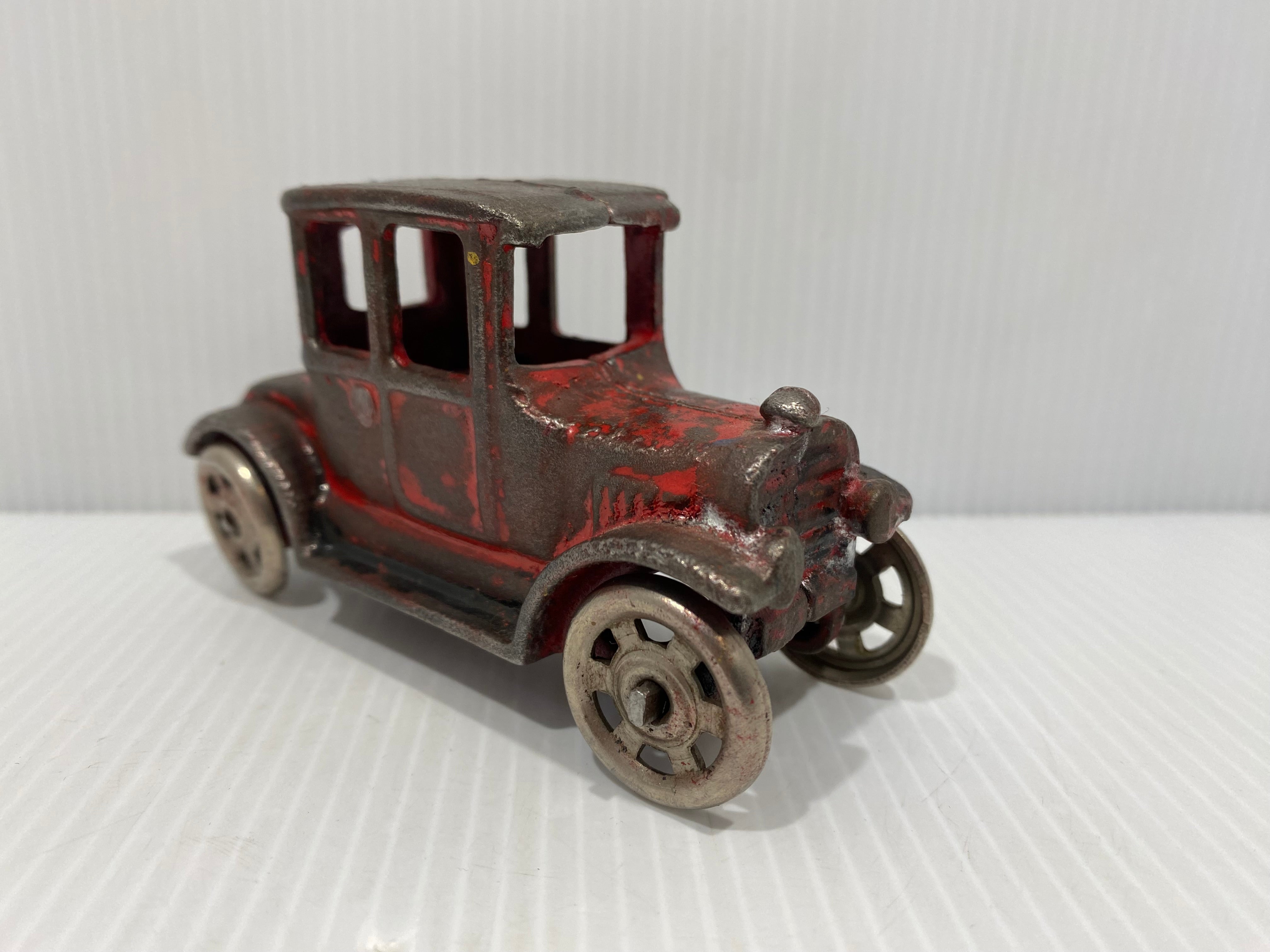 Manufactured by Arcade in the 1920s, this little cast iron car is based on a Ford Model T coupe.