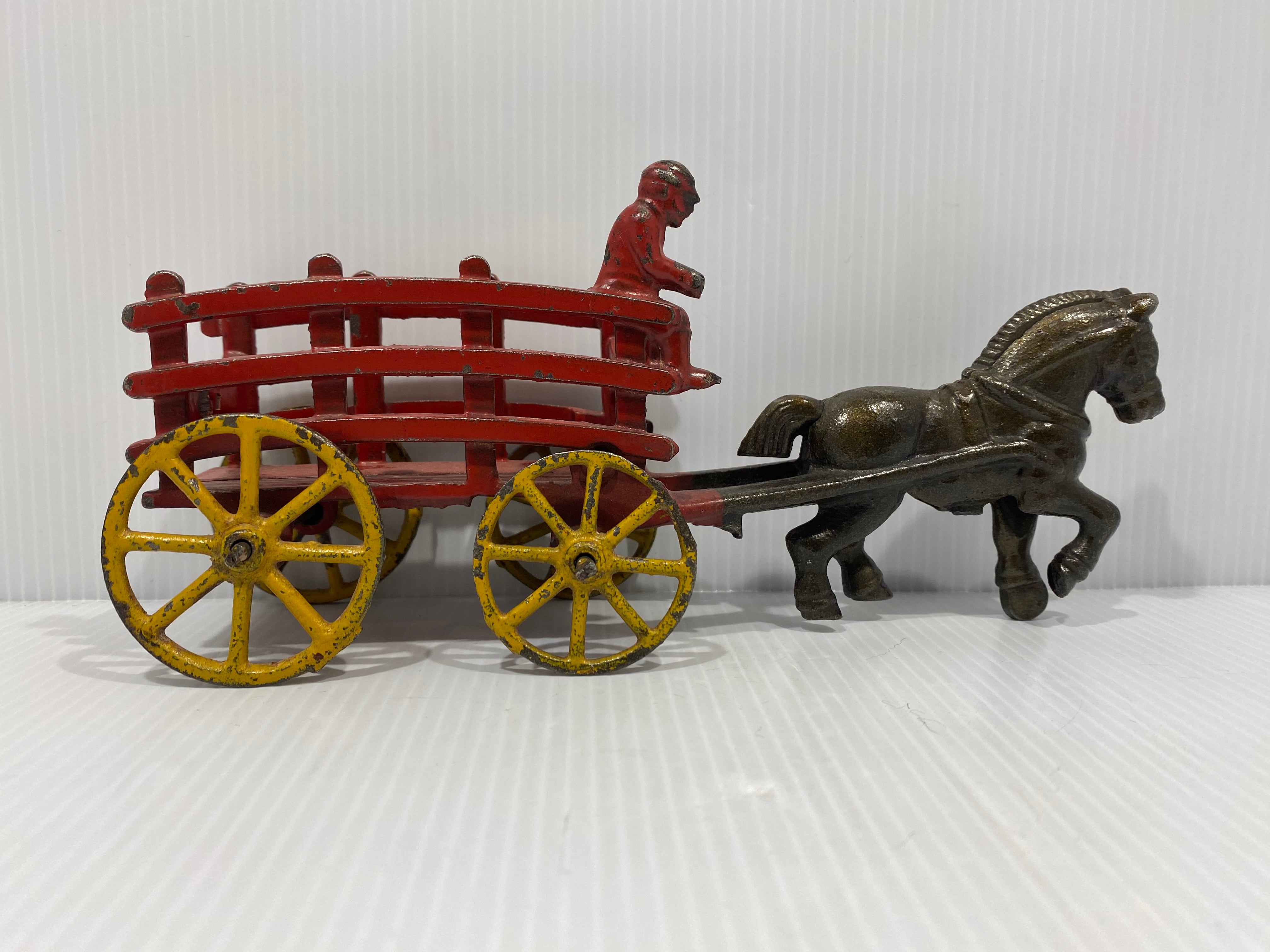 Original Red, stake wagons with cast in drivers. No cracks or repairs.