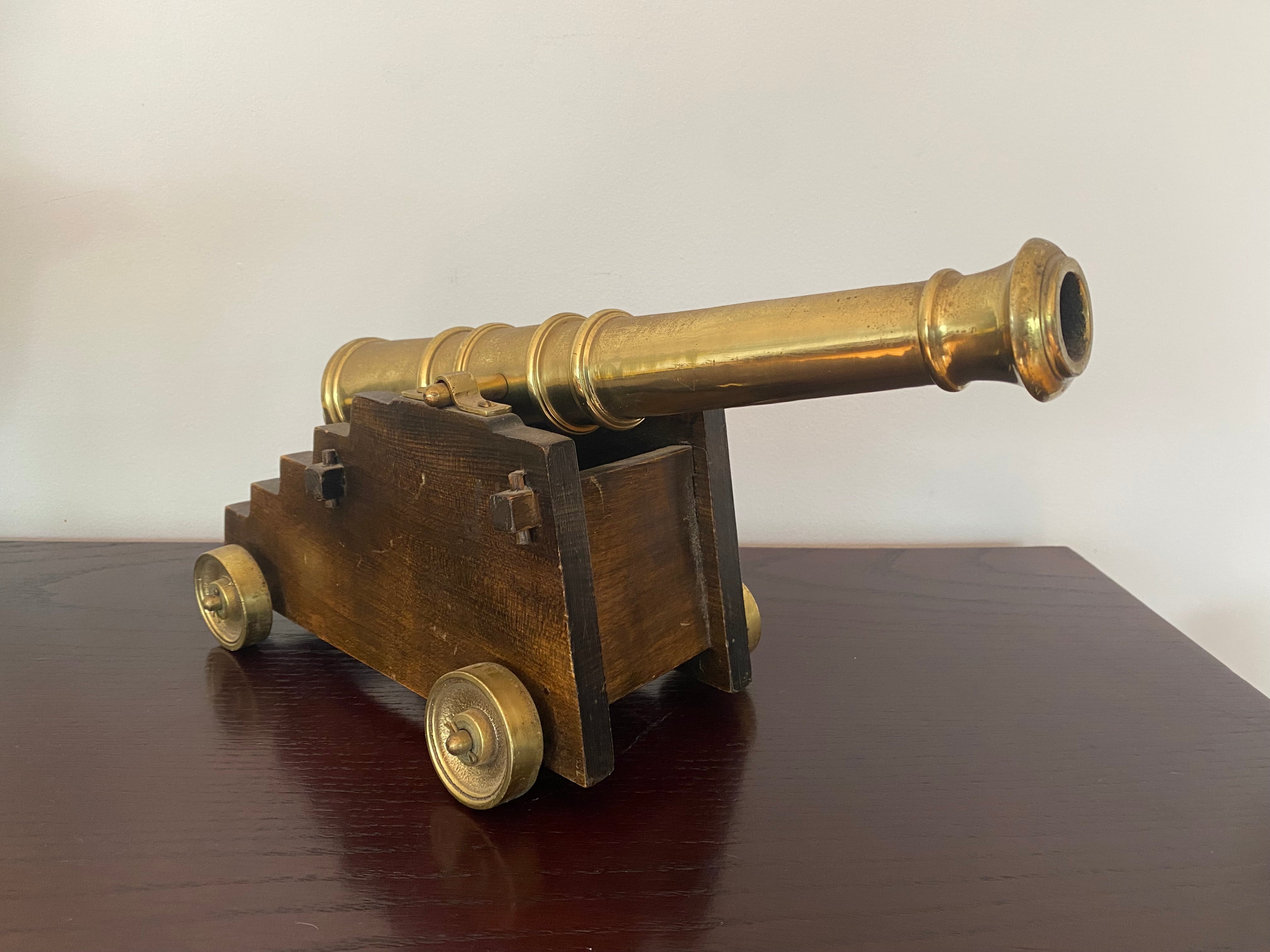 Vintage, mid 20th century, brass signal Cannon with wood base.