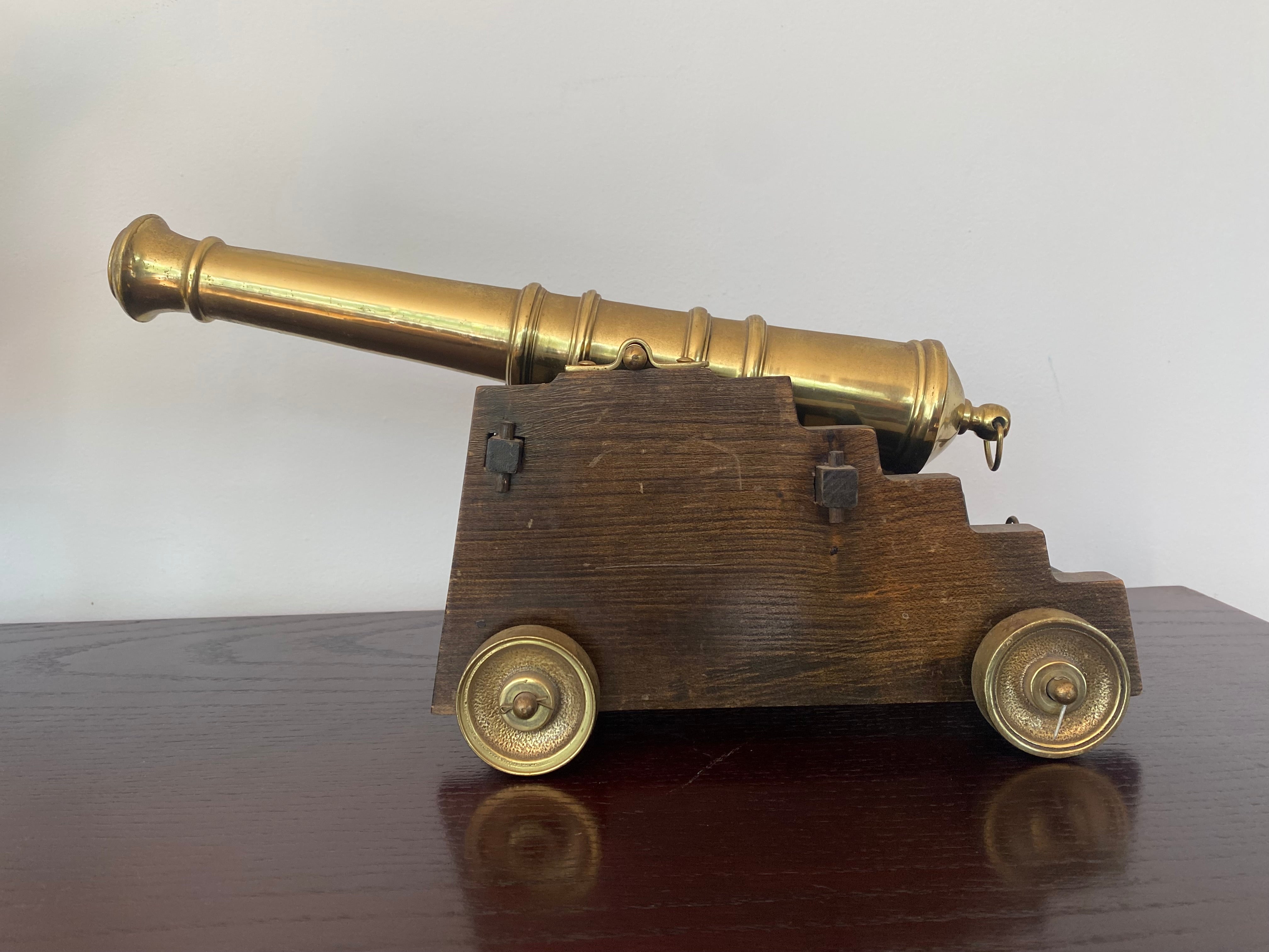 Vintage, mid 20th century, brass signal Cannon with wood base.