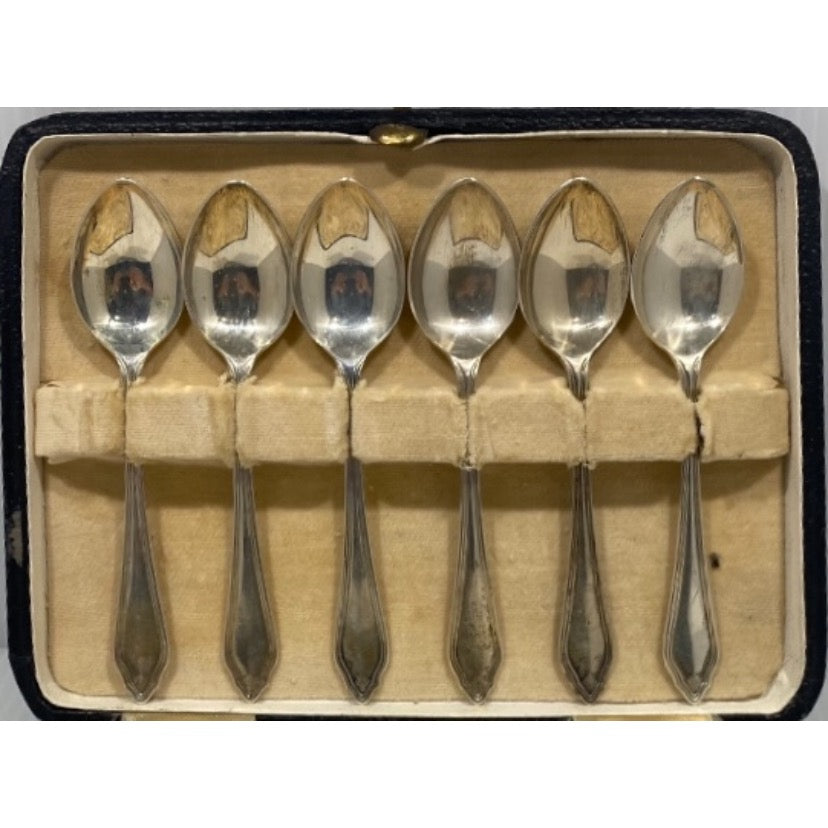 A cased set of six silver teaspoons hallmarked , maker EJE.