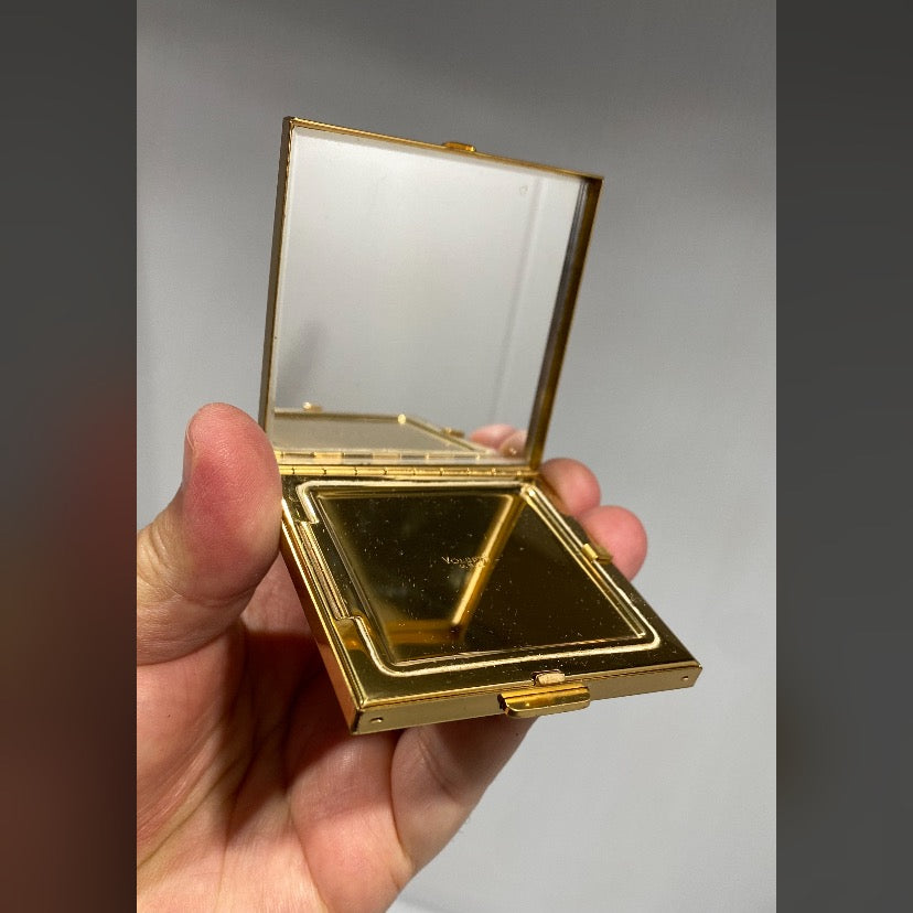 Vintage, 1950s, Volupte U.S.A. Makeup compact with mirror in a high quality goldtone metal case.