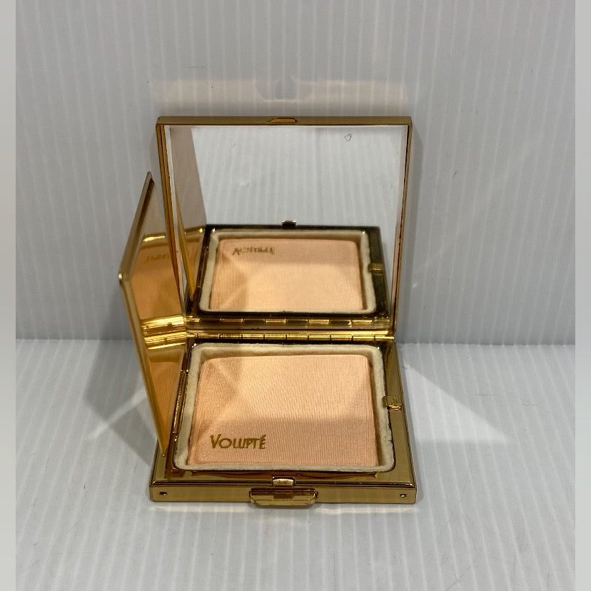 Vintage, 1950s, Volupte U.S.A. Makeup compact with mirror in a high quality goldtone metal case.