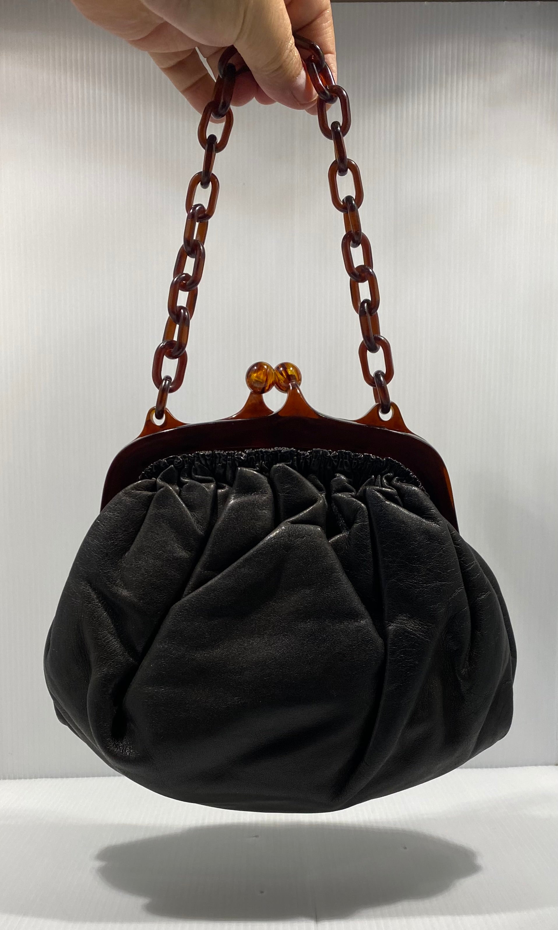 Vintage, 1950s, Black genuine leather bag, celuloid handles and celuloid  chaine.