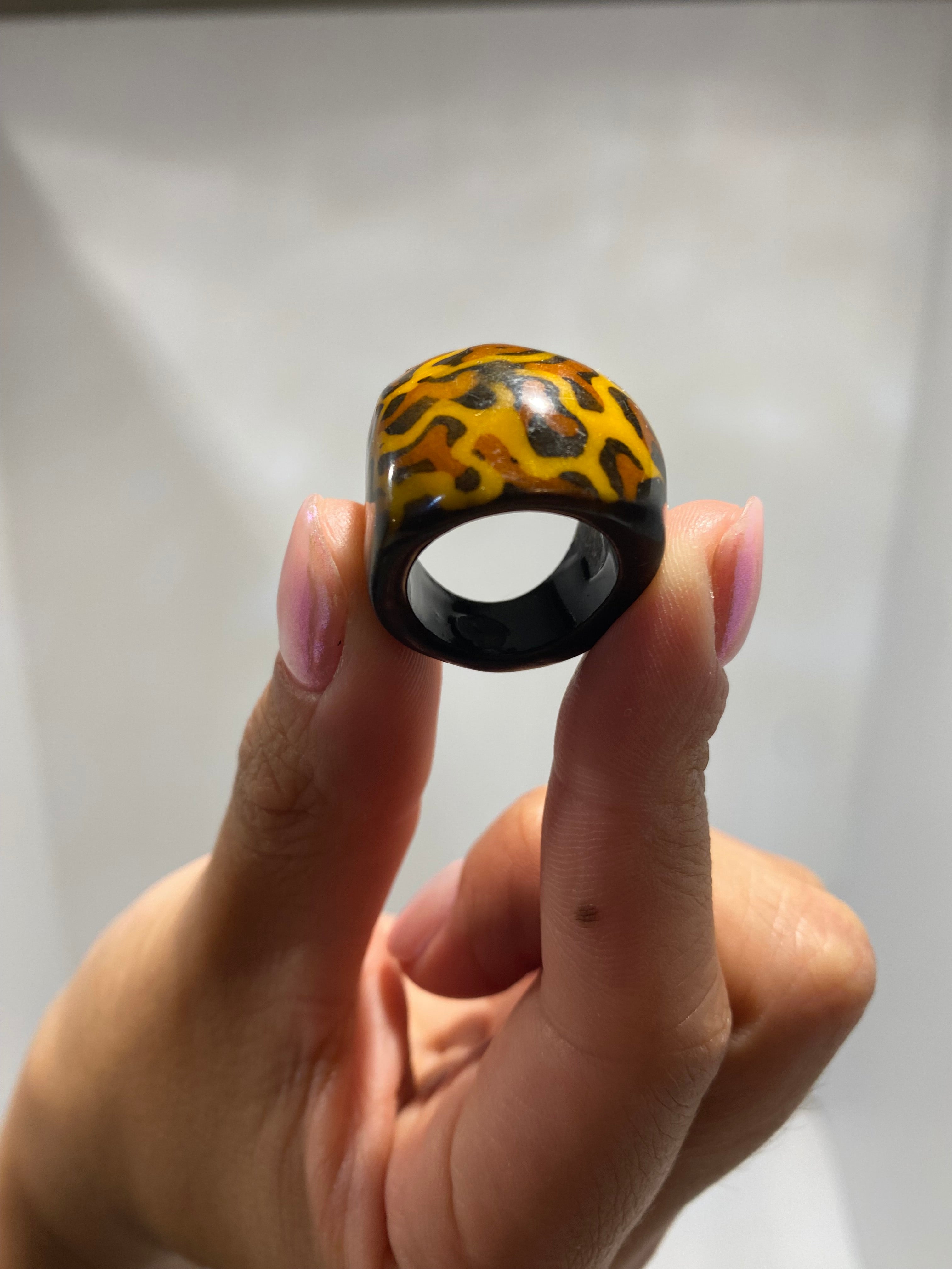 vintage and funny , plastic feline print ring. England 1970s
