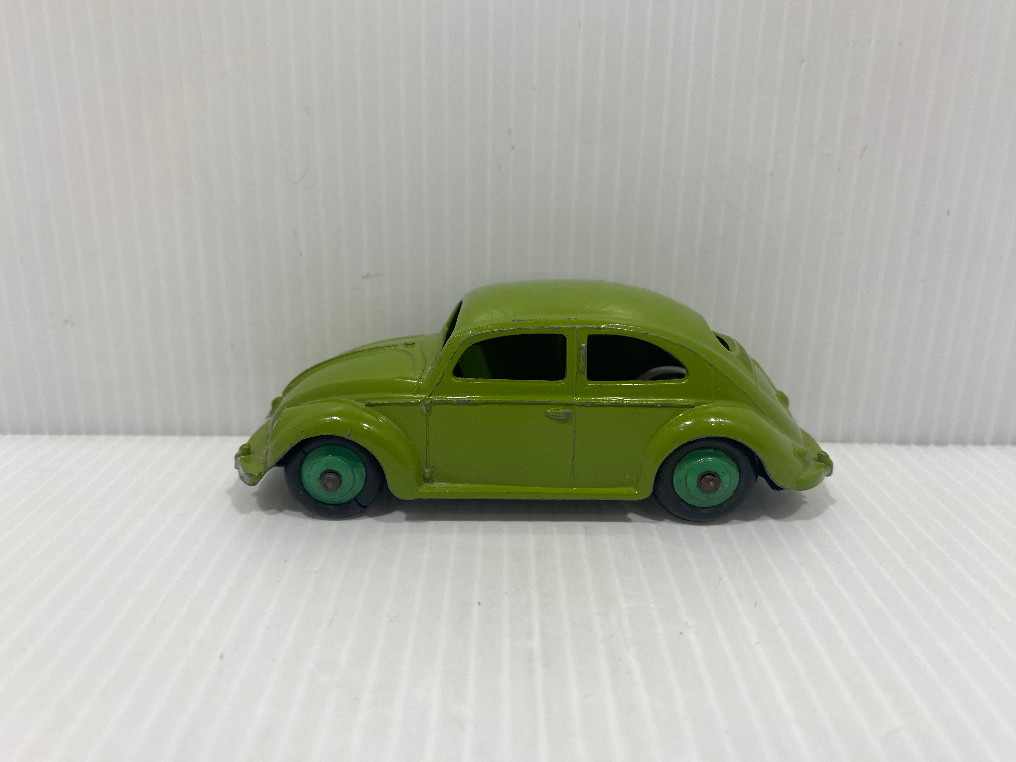 Dinky toys 181, Volkswagen saloon, lime green , original box.
