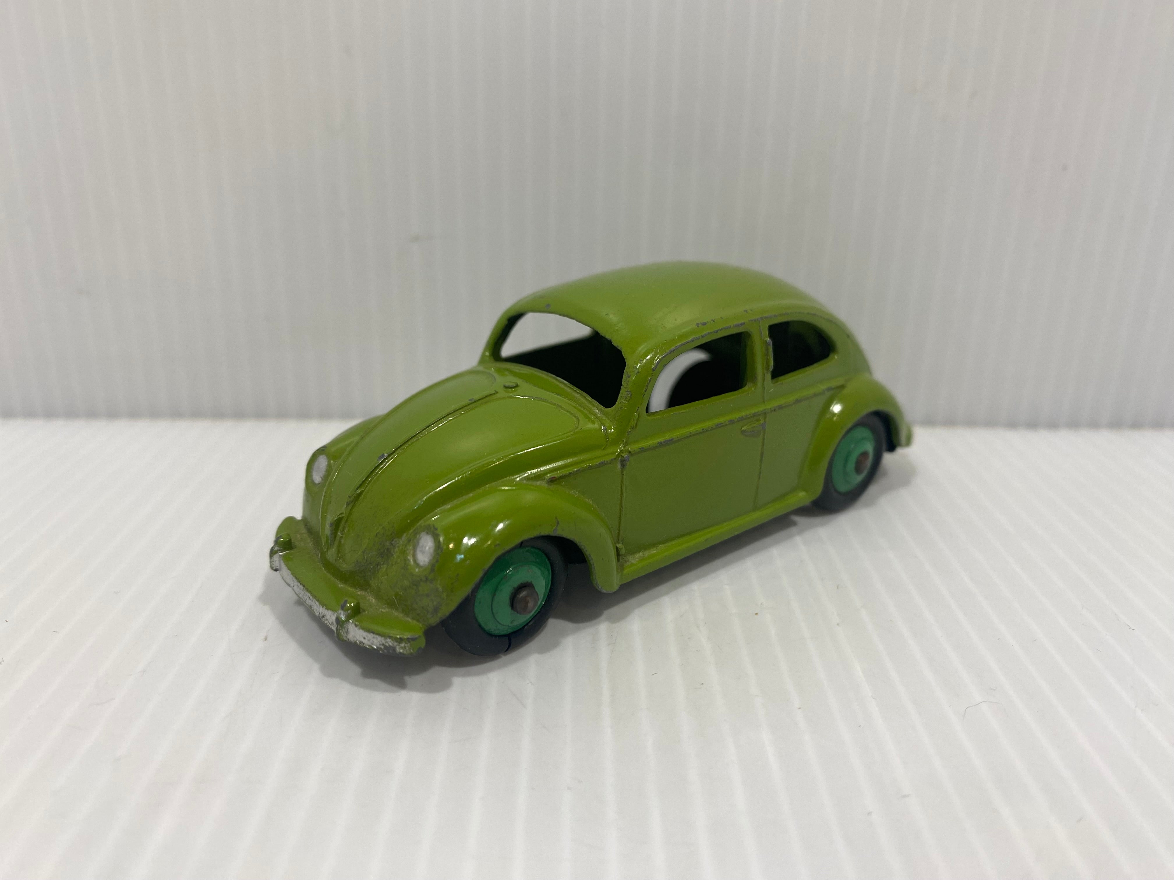 Dinky toys 181, Volkswagen saloon, lime green , original box.