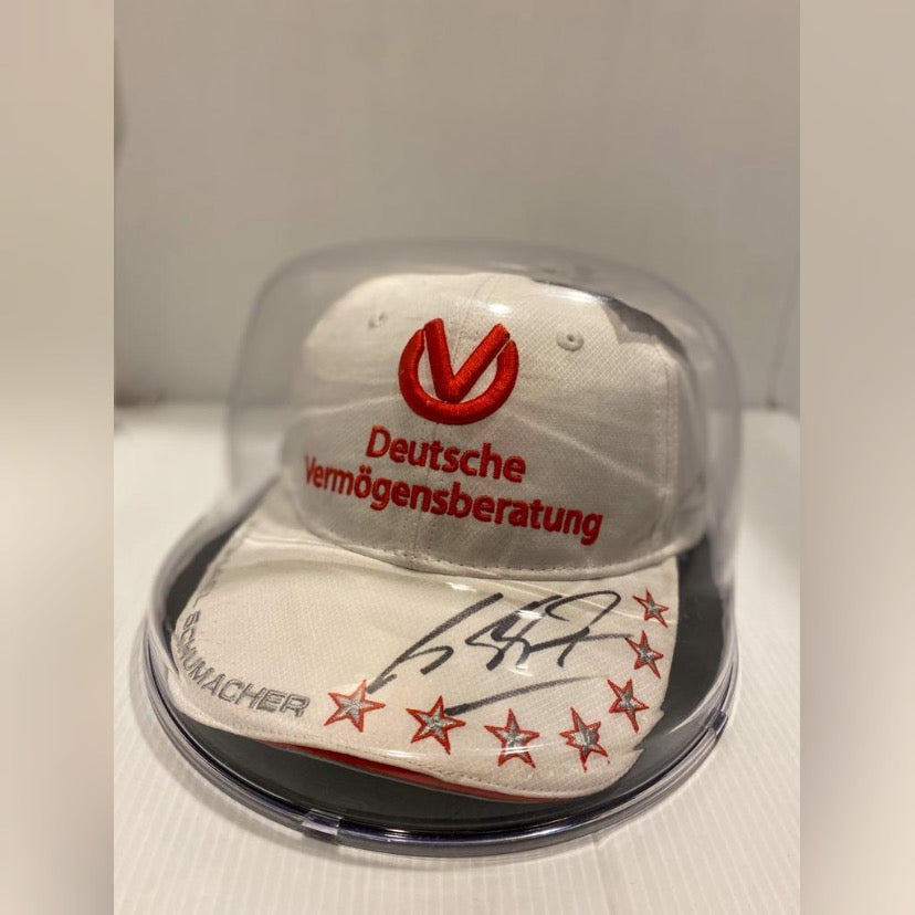 Autogramm Peaked cap from the Michael Schumacher Collection.