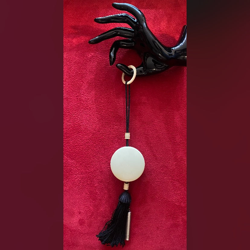 Very rare, 1920s Celluloid , Art Deco, compact and  lipstick flapper purse with a black tassel.