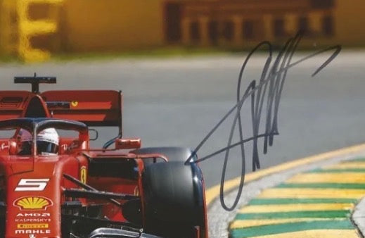 Sebastian Vettel Hand-signed Ferrari Formula One colour photo.Good condition.