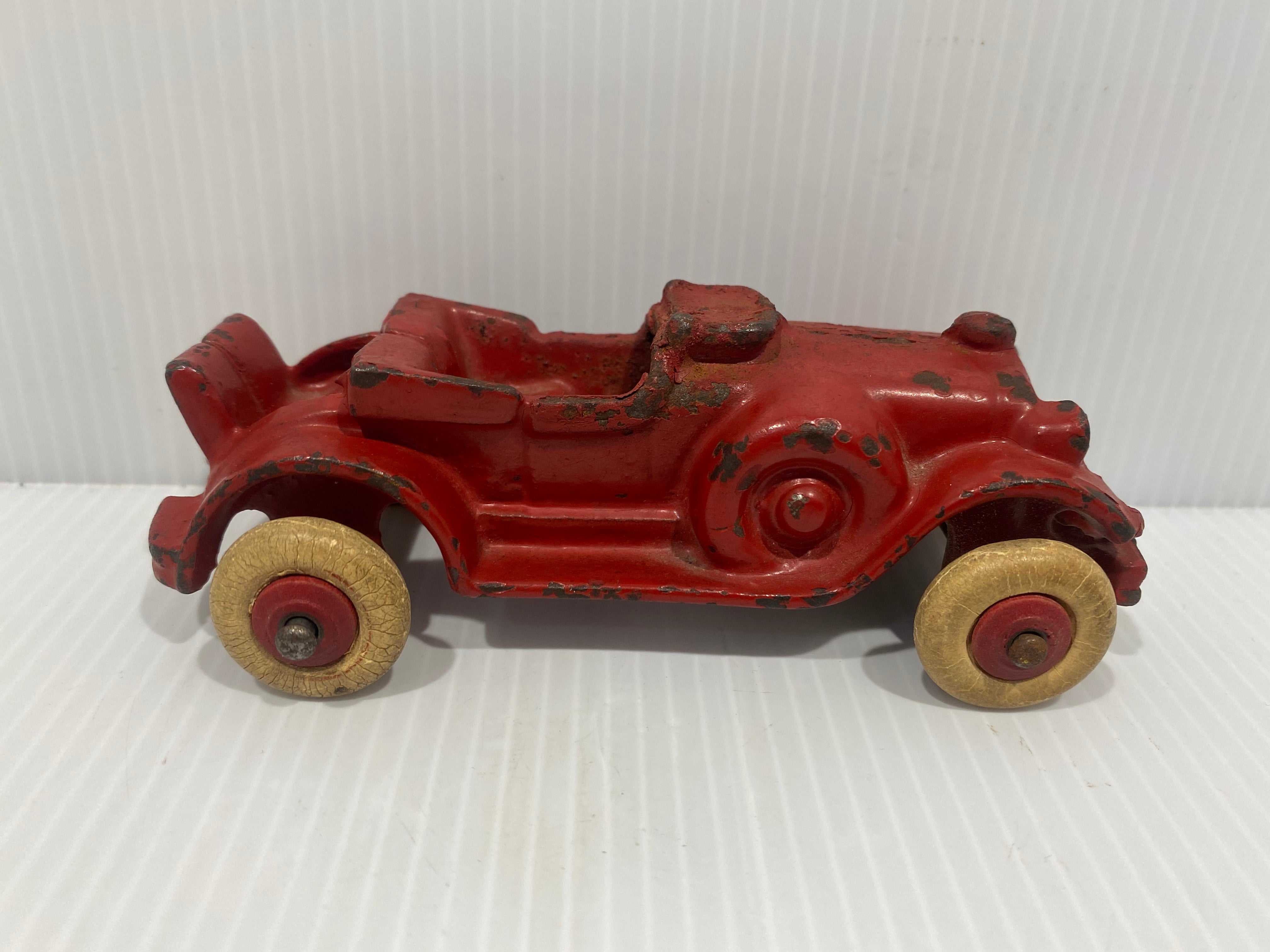 1920s cast iron Ragtop Roadster with rumble seat by Hubley in original paint.