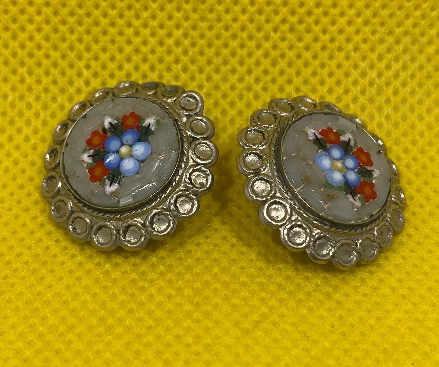 Beautiful pair of Italian vintage clip on Micromosaic earrings with a typical floral design.