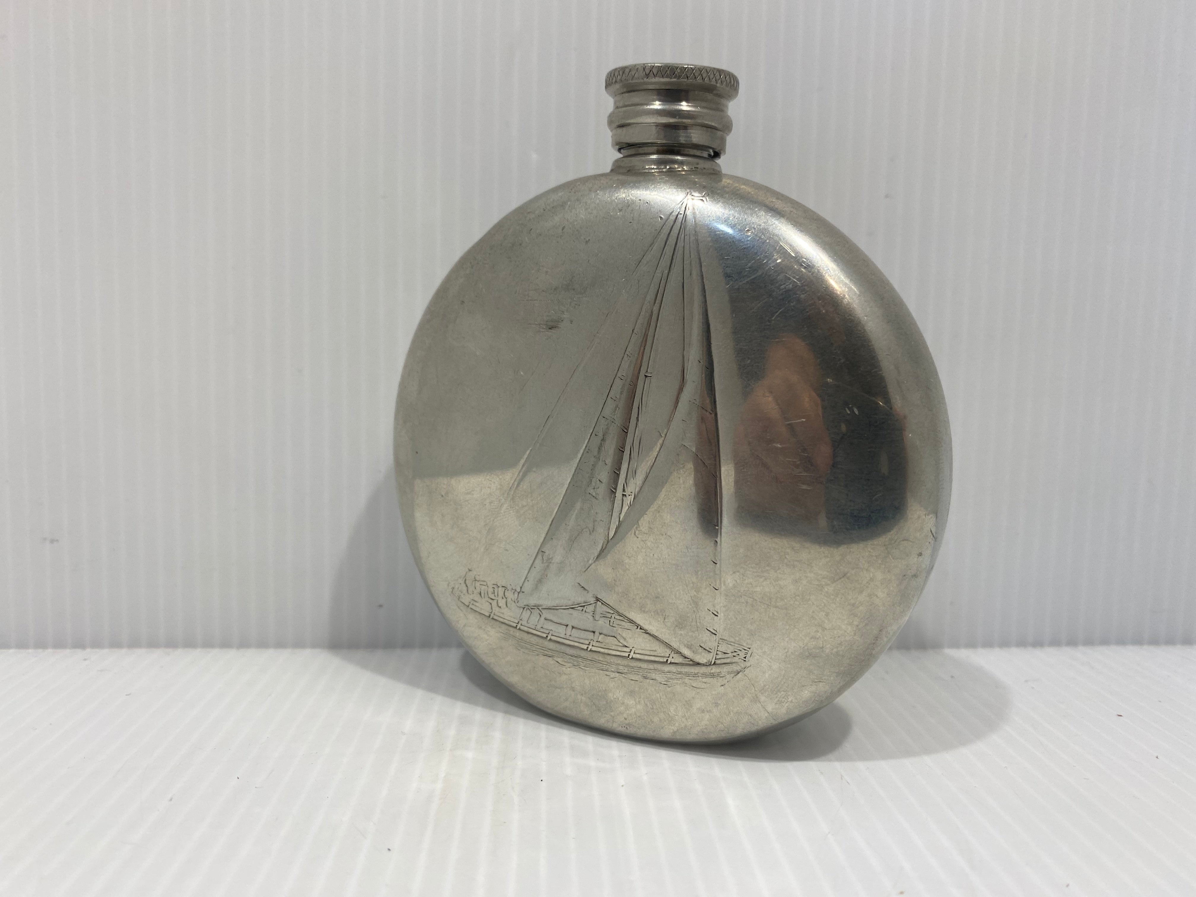 Antique Pewter flask. Sheffield: Pinder Bros., [1907].
