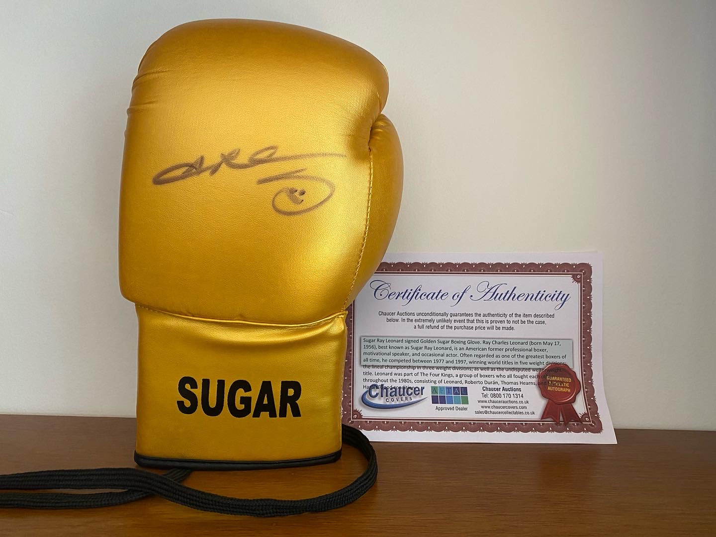 Sugar Ray Leonard signed Golden Sugar Boxing Glove.