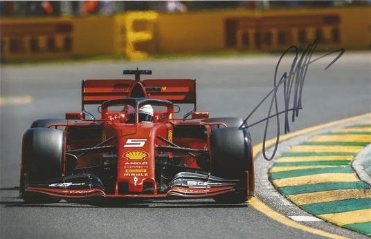 Sebastian Vettel Hand-signed Ferrari Formula One colour photo.Good condition.