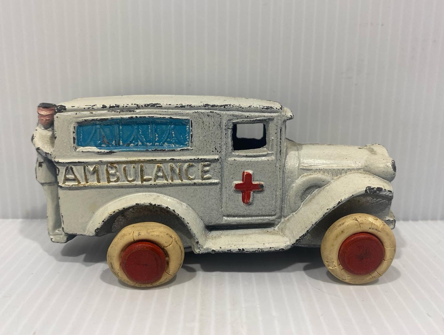 Rare Antique Savoye Pewter Toy Company Ambulance Car with a cast-in attendant perched precariously on the rear step