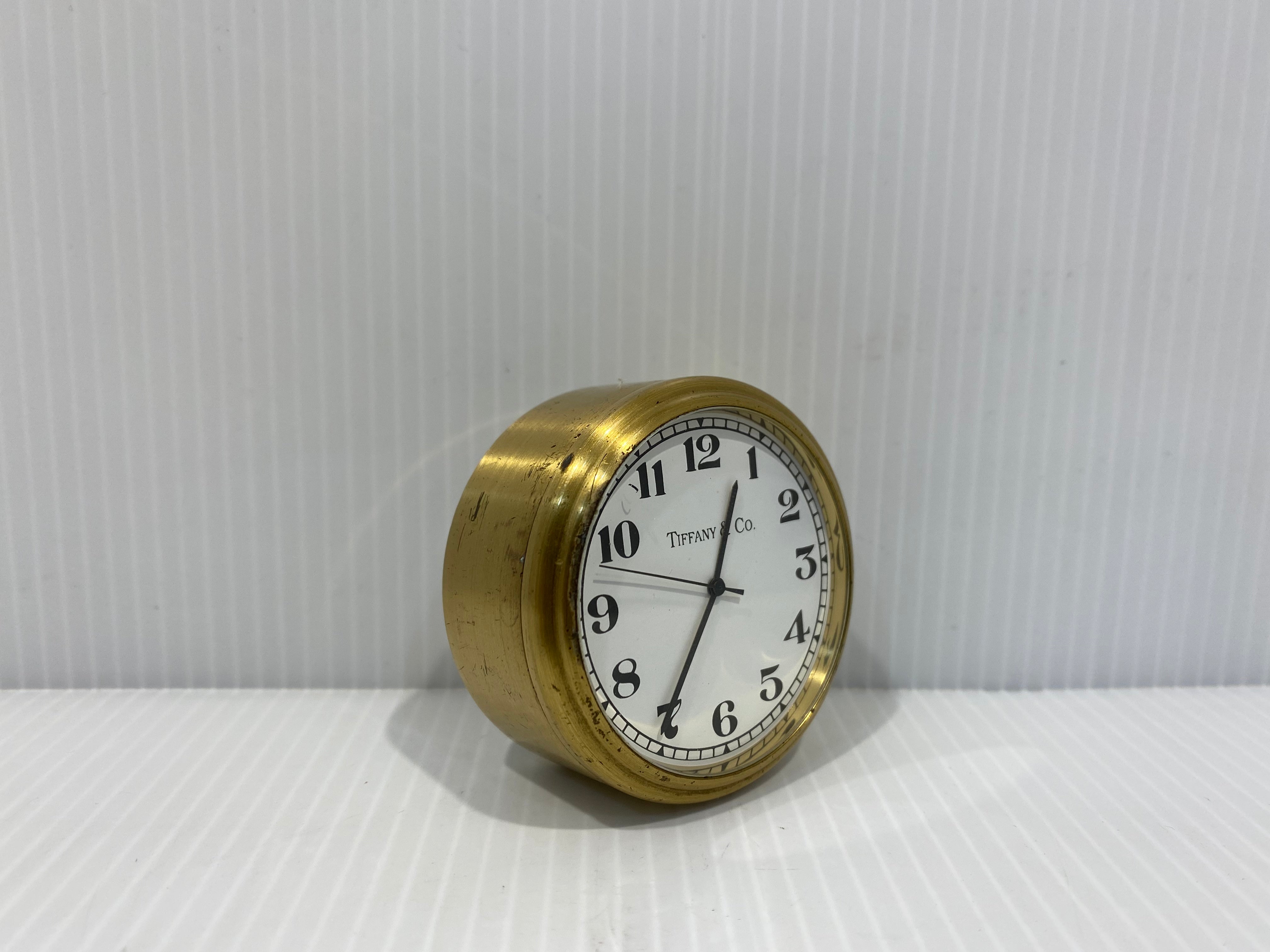 Tiffany & Co. Completely Round Small Brass Guartz Desk Clock With Alarm.