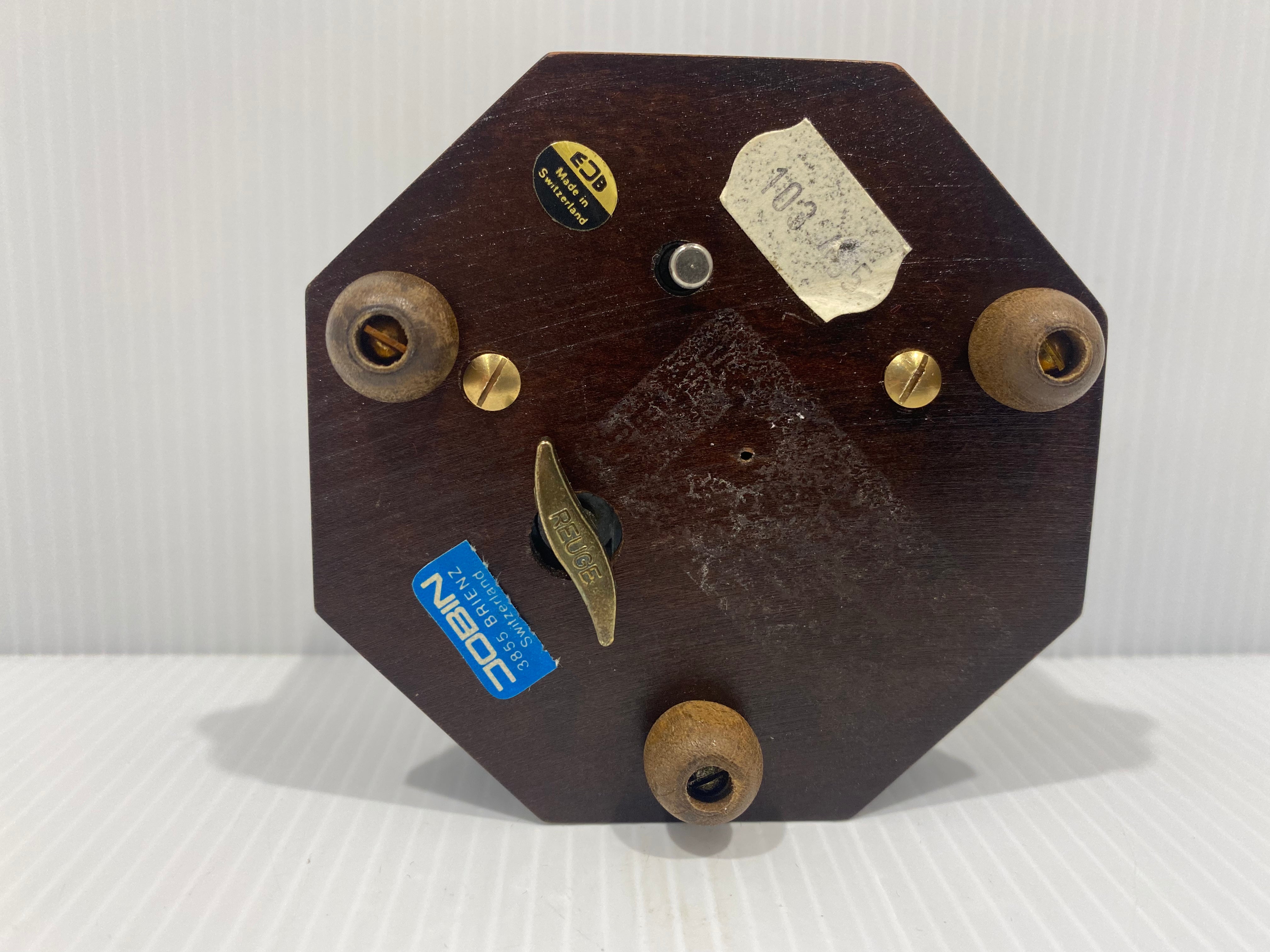Octagonal wood musical Jewelry box.