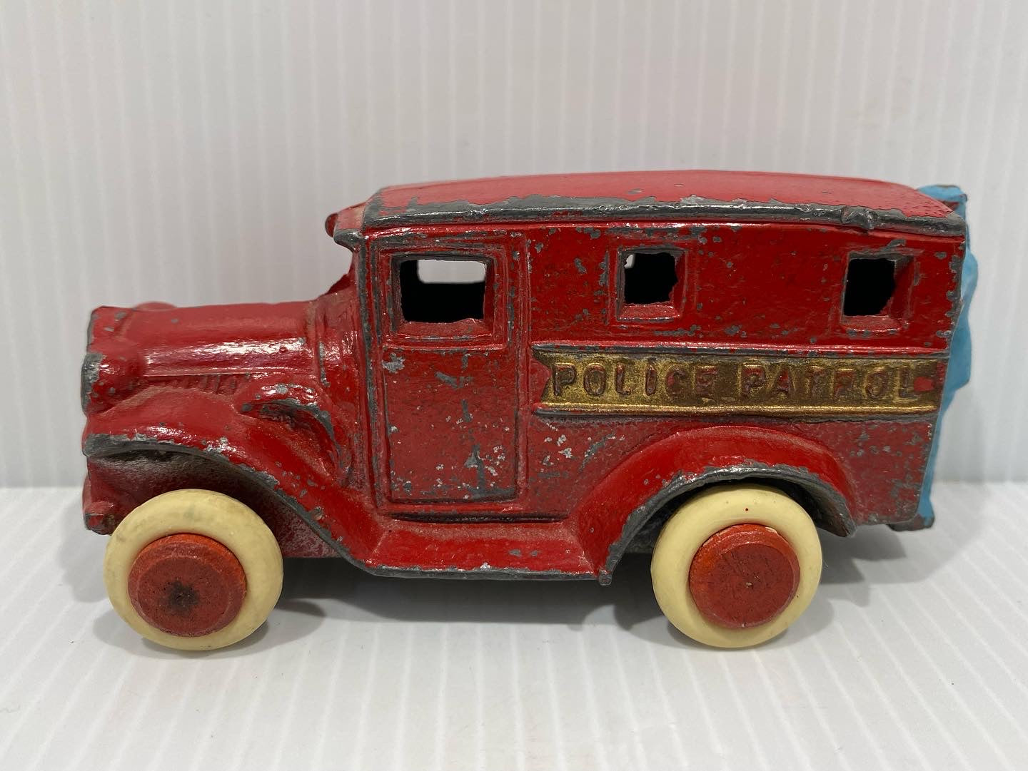 Rare Antique Savoye Pewter Toy Company police patrol Car with a cast-in attendant perched precariously on the rear step