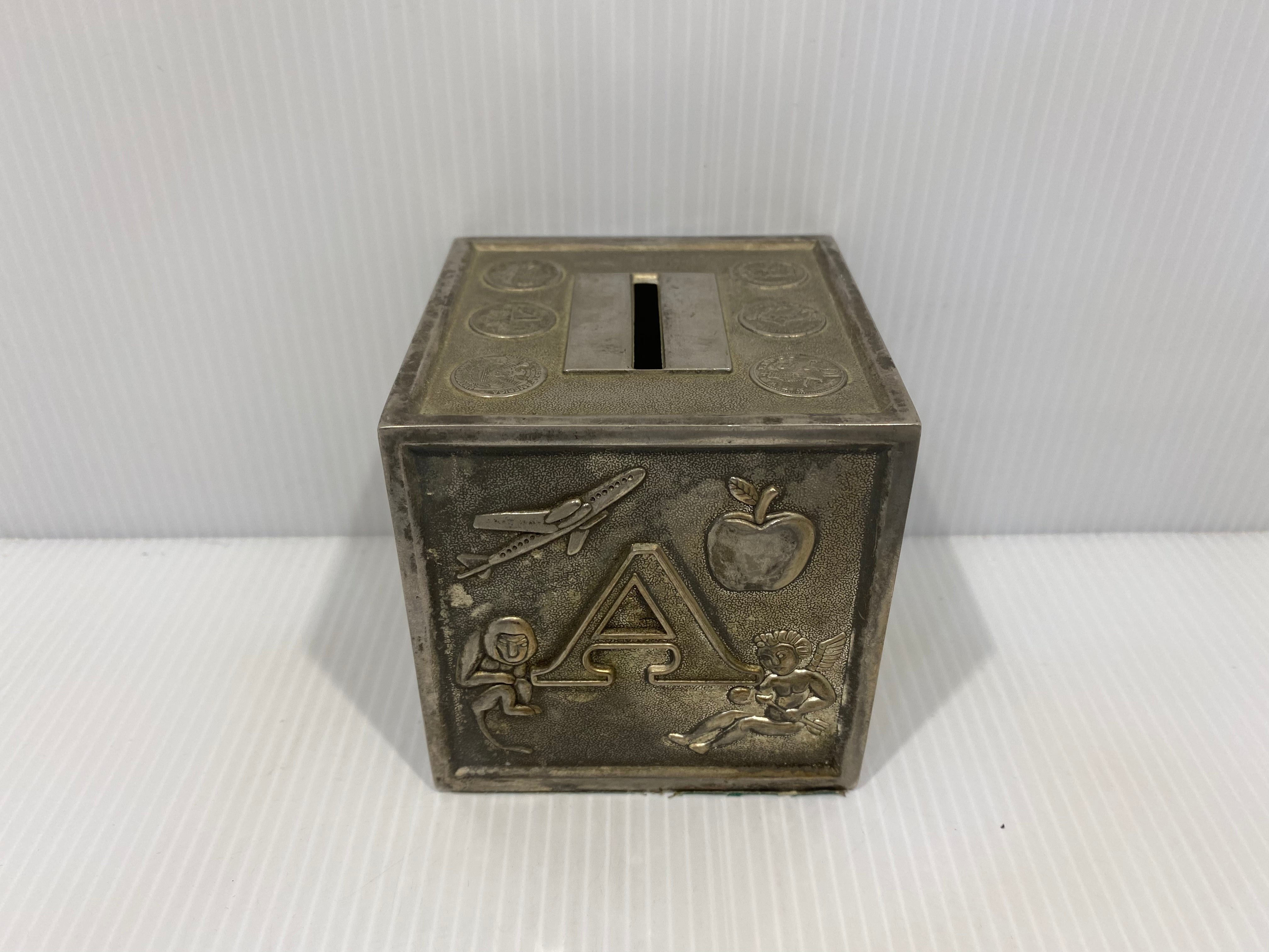 German 1960s coin bank is silver plated