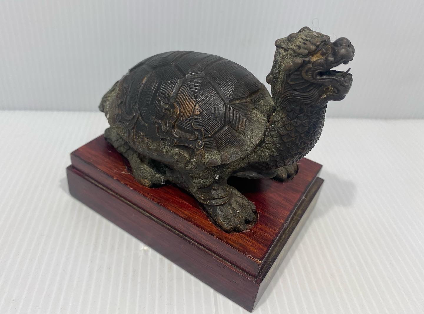 Antique Chinese Bronze Figure of a Dragon-Turtle with wood base. 1910s.