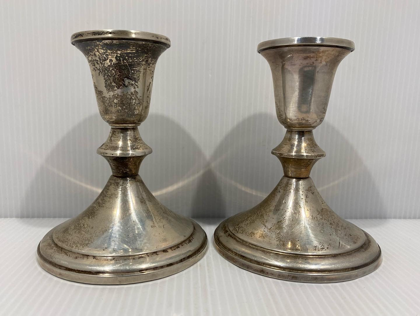 Sterling silver molded candlesticks by Towle in mid-century modern style