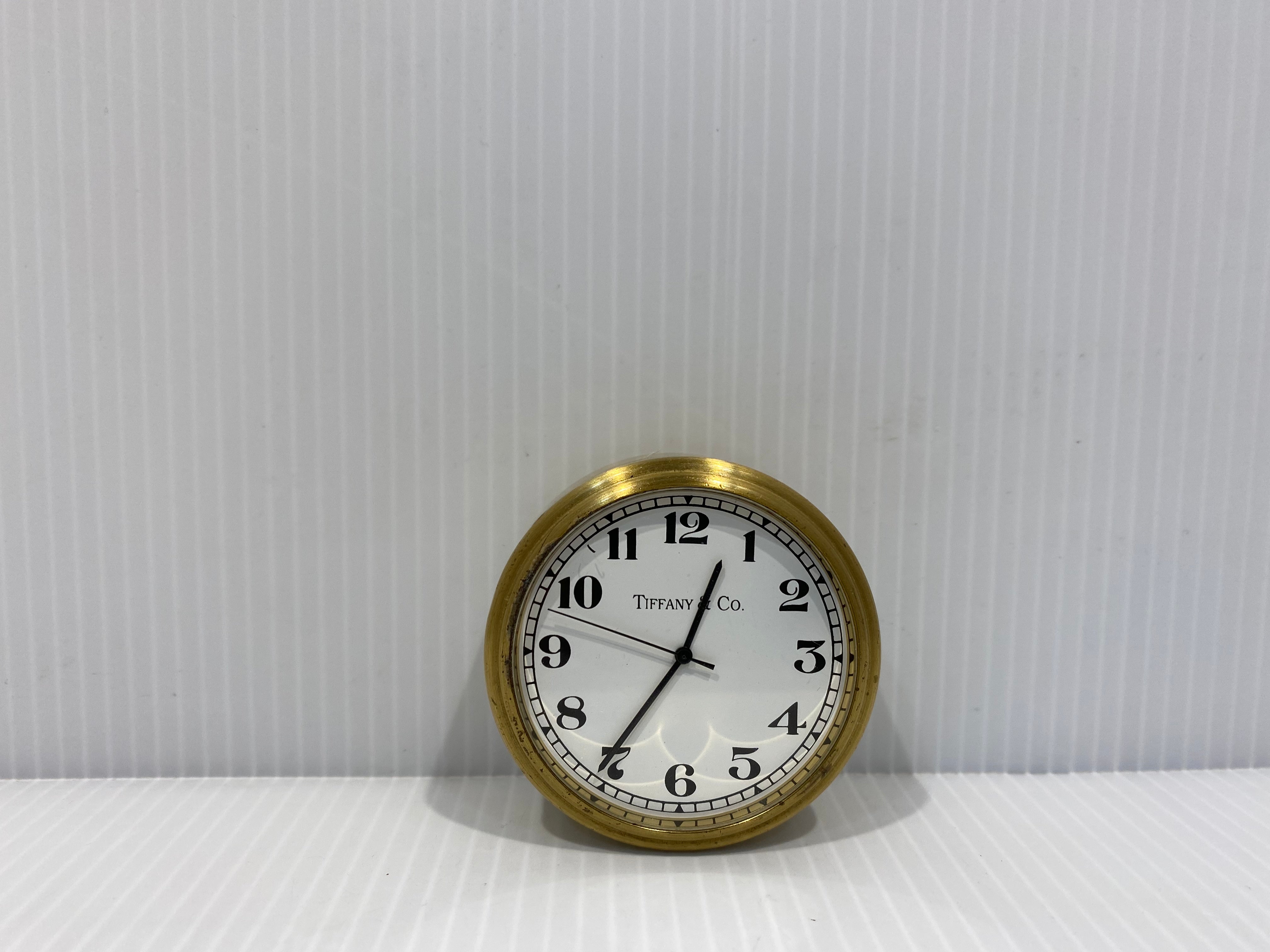 Tiffany & Co. Completely Round Small Brass Guartz Desk Clock With Alarm.