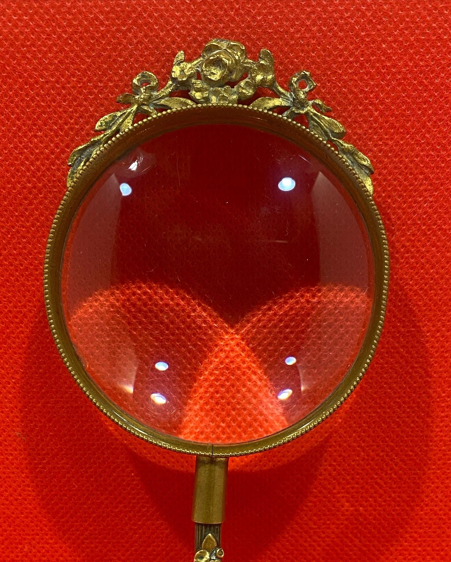 An antique magnifying glass, French Empire