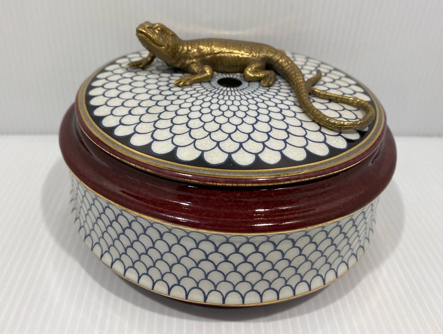 vintage circular ceramic box, with bronze lizard decoration to the lid. England 1960s