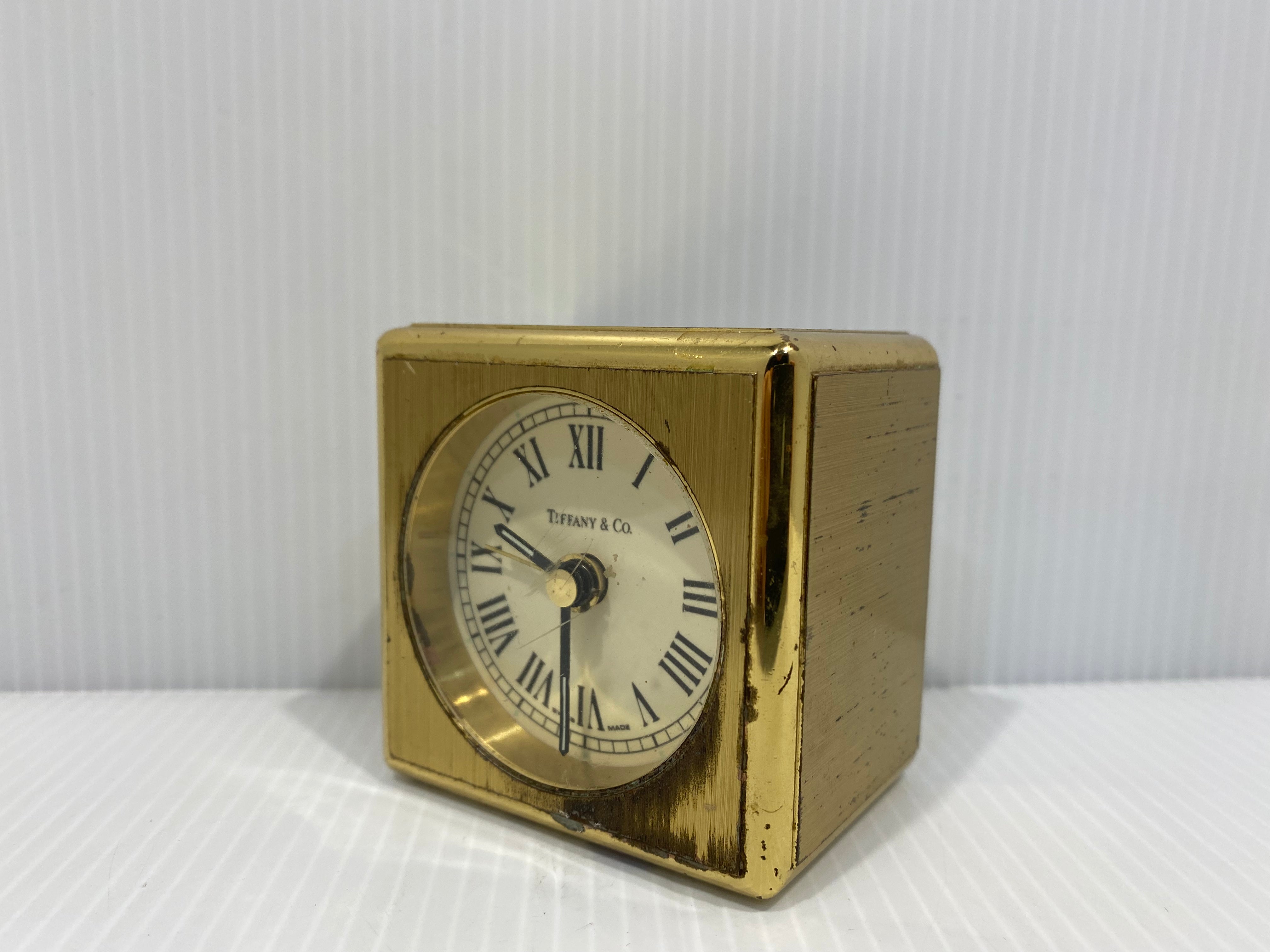 Tiffany & Co. solid brass collectible cube clock. Made of heavy thick brass with quartz clock and Alarm
